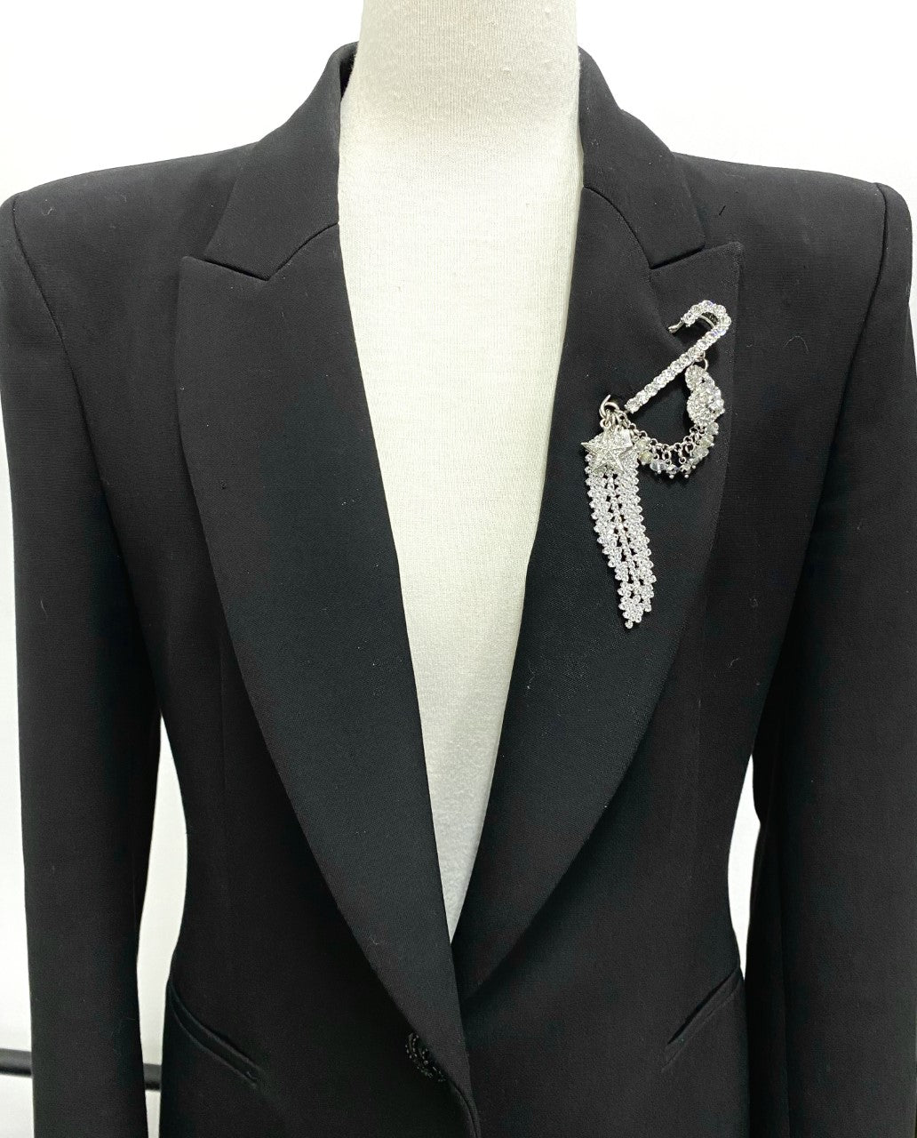 Rita Tesolin-Toronto-Brooch/Pin
Crystal pin, crystal feather, heart, star and cascades.  Artistic, exclusive, 
and handcrafted, this piece is a unique and collectable work of art. Crafted with the finest quality materials, it is made in Toronto.