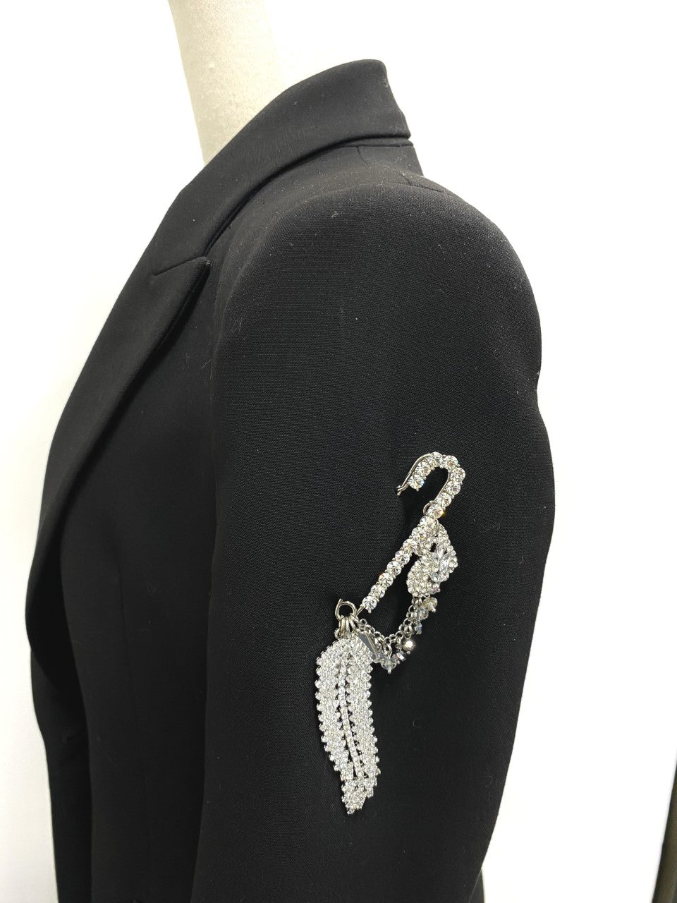 Rita Tesolin-Toronto-Glam Brooch/Pin
Crystal pin, crystal feather, heart, star and cascades.  Artistic, exclusive, and handcrafted, this piece is a unique and collectable work of art. Crafted with the finest quality materials, it is made in Toronto.