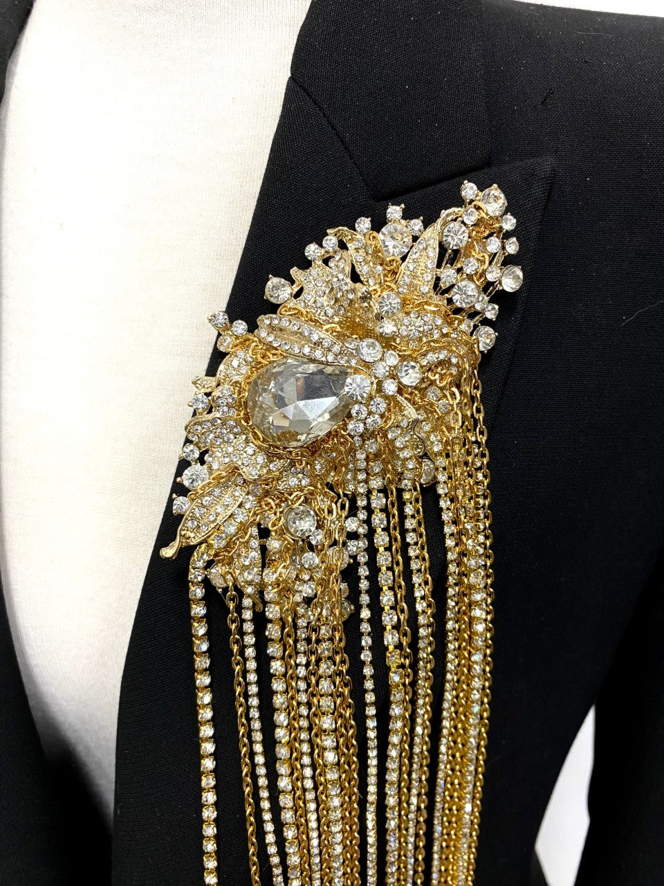Gold Metal, brooch, crystal cascades, Statement, Artistic, One-of-a-kind, exclusive, and handcrafted, this piece is a unique and collectable work of art. Crafted with the finest quality materials, it is made in Toronto.