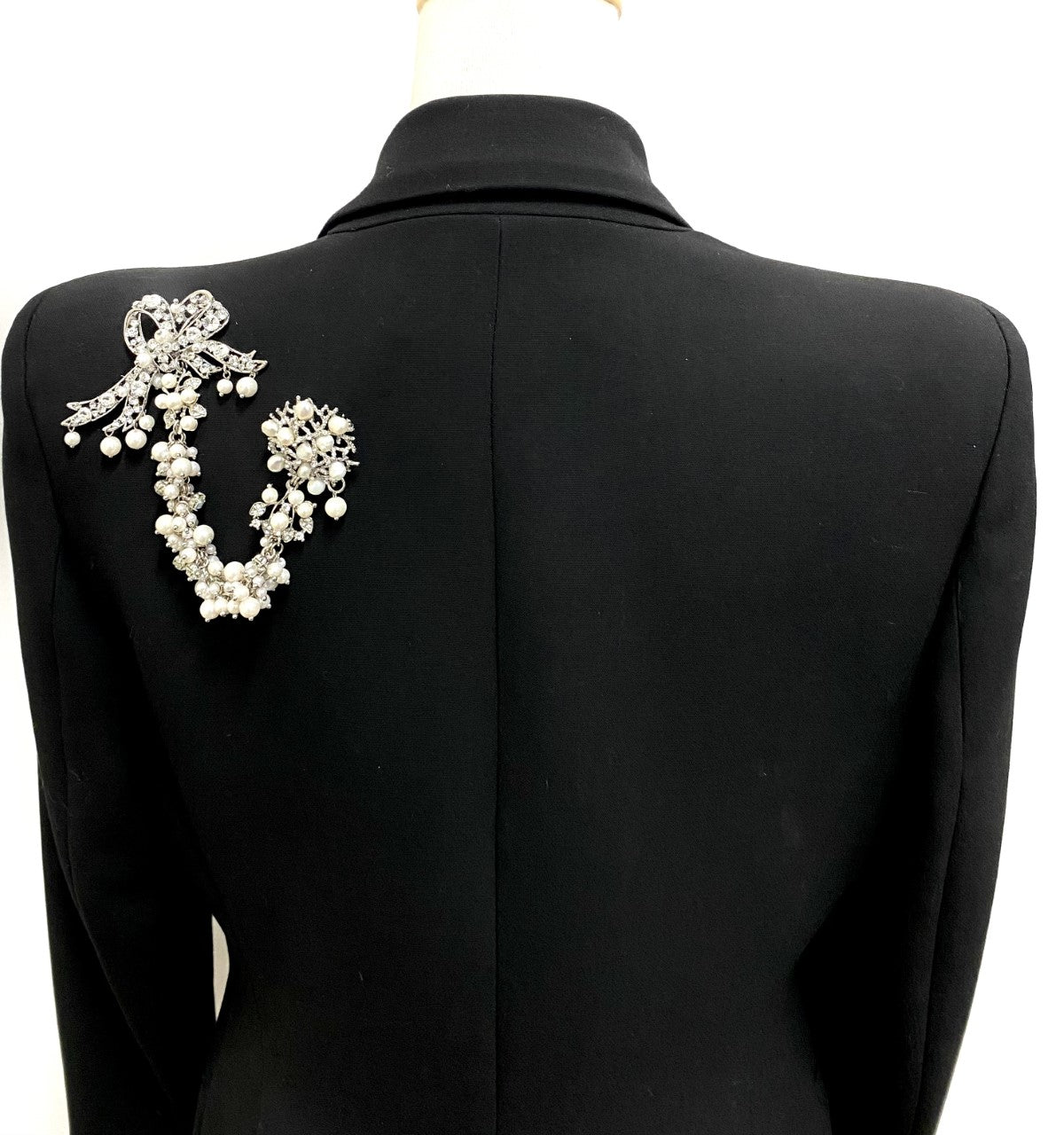 Artistic, exclusive, handcrafted, and one-of-a-kind. Collectable, finest quality, made in Toronto, Canada. Woman-owned and operated.  Crystal Bow, Austrian Crystal, Pearl, Brooch